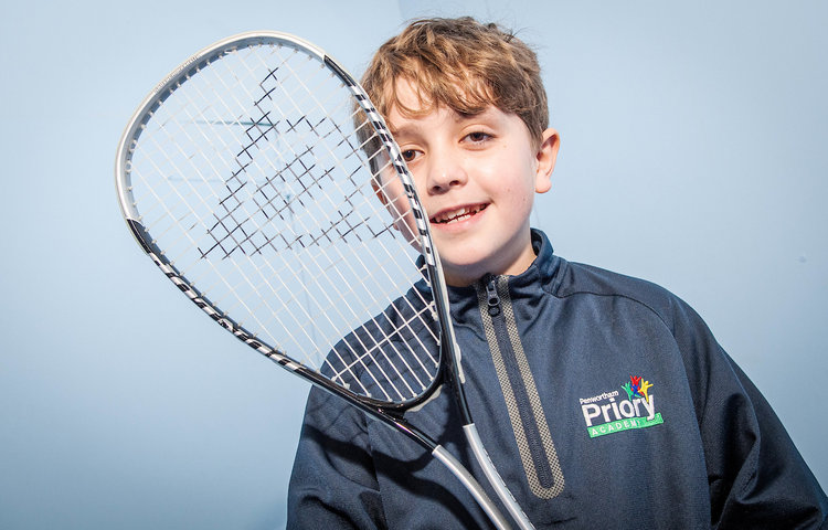 Image of Oliver is making his mark as a squash player