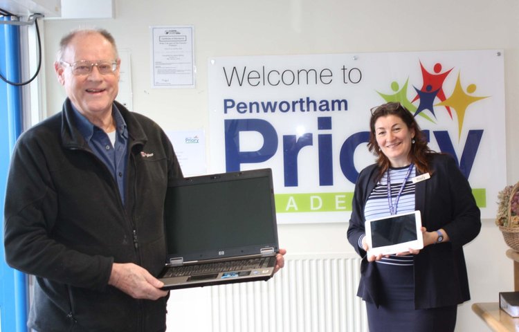 Image of IT devices donated to Priory families