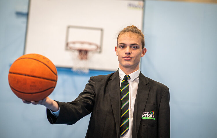 Image of Year 11 pupil aims high at basketball